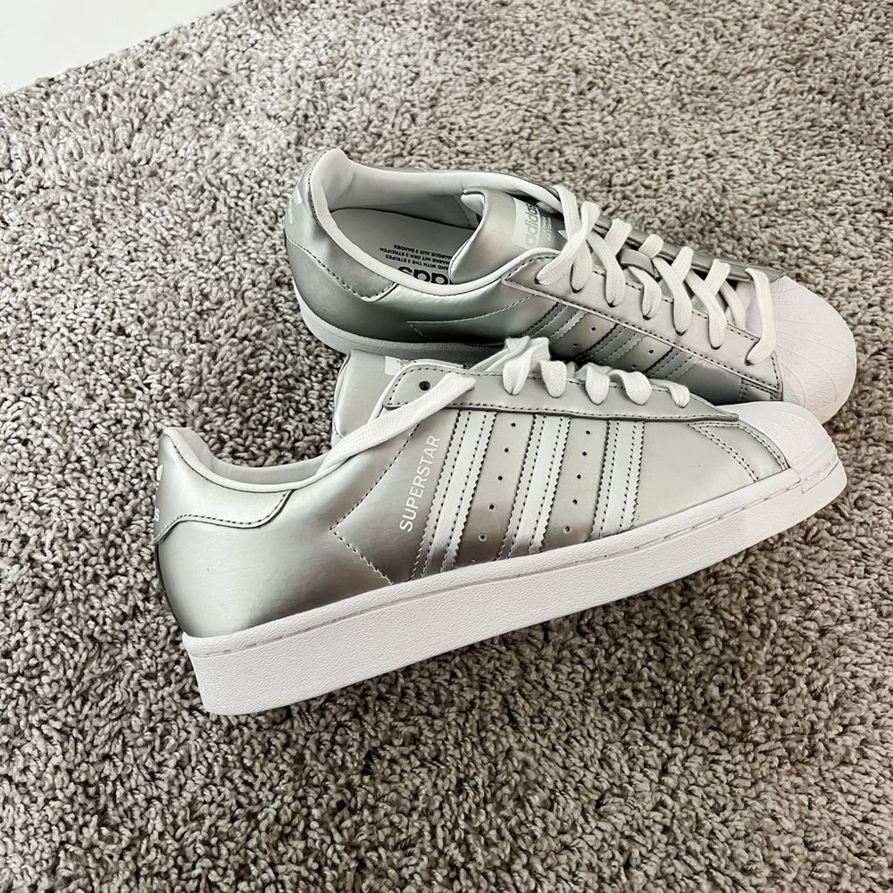 Silver Adidas sneakers